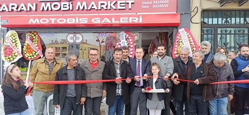 KAYMAKAM KAPANKAYA "BAŞARAN MOBİ MARKET" ADLI İŞ YERİNİN AÇILIŞ TÖRENİNE KATILDI